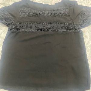 Black simple blouse.
